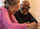 mature couple working at laptop